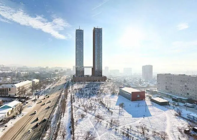 Строительство двух башен высотой 161 м и 45 этажей, соединённых мостом, отложено по причине финансовых задержек; решение по проекту ожидается до конца года.